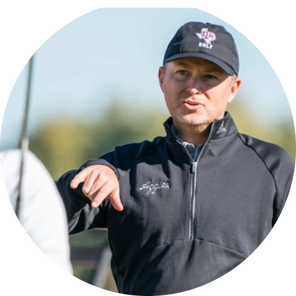 Golfer driving in front of the ocean
